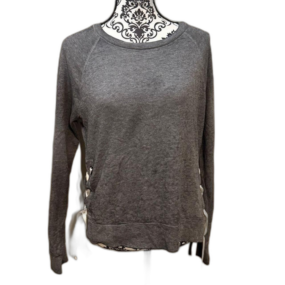Chic gray sweatshirt with stylish ribbon accents on the sides